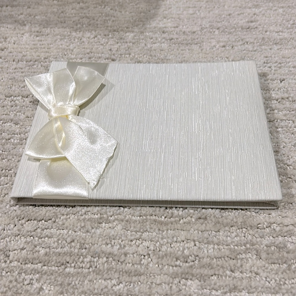 Ivory Silk Cover Guest Book with Satin Bow by CR Gibson